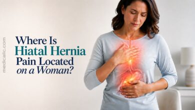 Woman showing where hiatal hernia pain is located in the chest and upper abdomen